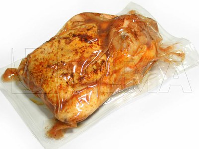 Empacado de pollo asado en caliente a 90ºC en termoformado al vacío en film  flexible — ULMA Packaging