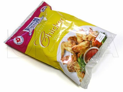 Empacado de trozos de pollo congelado en bolsa almohadilla en film polietileno