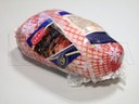 Empacado de jamón cocido al vacío en FLOW-VAC®