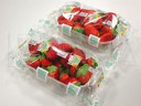 Empacado de charolas de fresas en flow pack