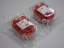Empacado de charola con tomate cherry en flow pack