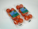 Empacado de agrupación de tomates con y sin charola en flow pack