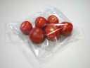 Empacado de tomates en racimos o a granel en máquinas flow pack