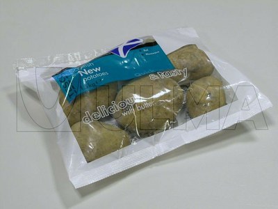 Empacado de papas enteras en bolsa almohadilla en film polietileno especial