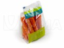 Empacado de zanahorias de tamano medio en paquete fondo estable con soldadura 4 esquinas en film BOPP.