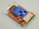 Empacado de zanahorias enteras en film polipropileno microperforado y film polietileno macroperforado