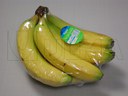 Empacado de penca de plátanos en flow pack en film retráctil