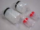 Empacado de frascos de plástico en flow pack